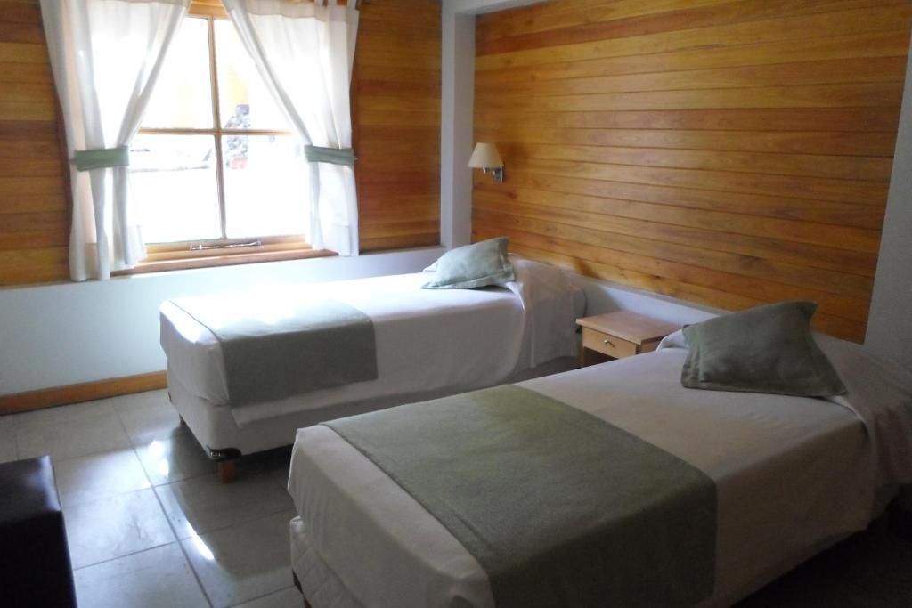 Apart Hotel Robles Del Sur San Martín de los Andes Quarto foto